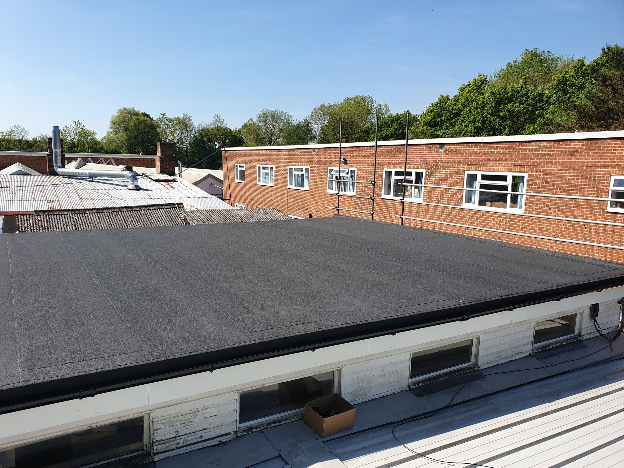 Flat roof felting over a workshop in Crawley, West Sussex