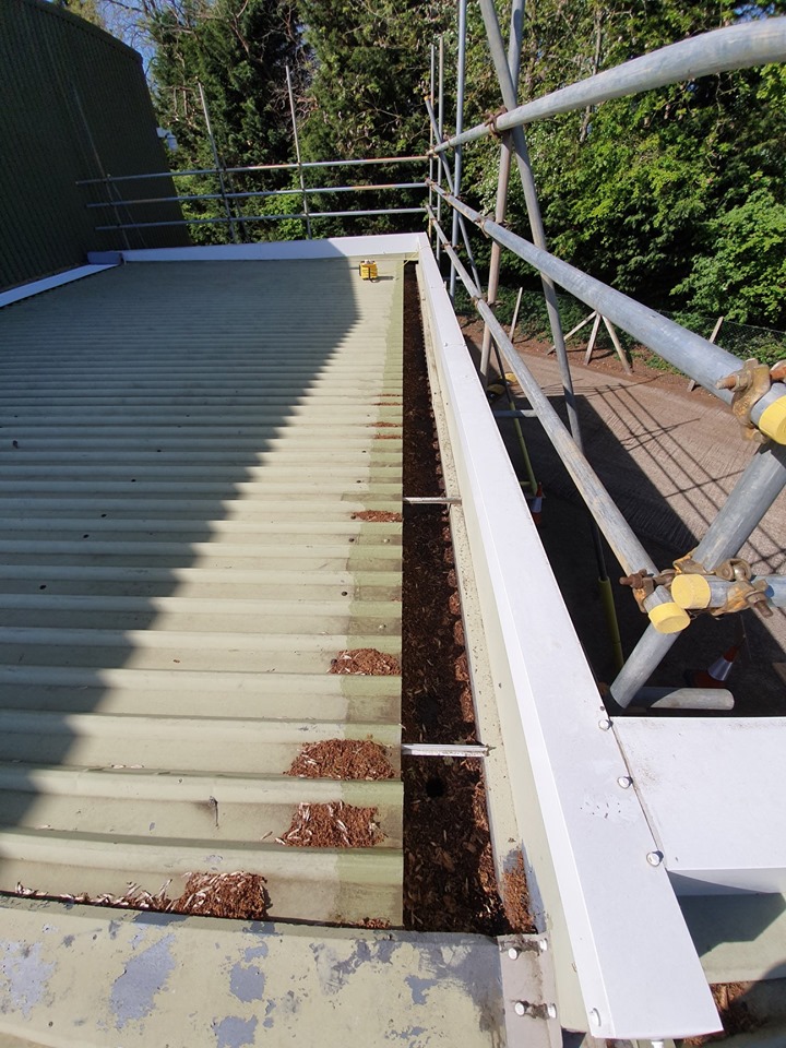 Warehouse leaking gutter in Horsham, West Sussex