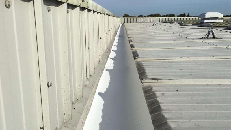 Guttering a factory and office roof in Sidcup, Kent