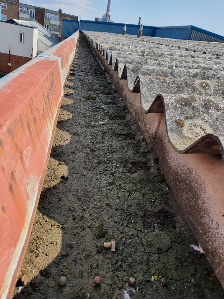 Office Building Guttering Contract to a Roof in Southwick, West Sussex.