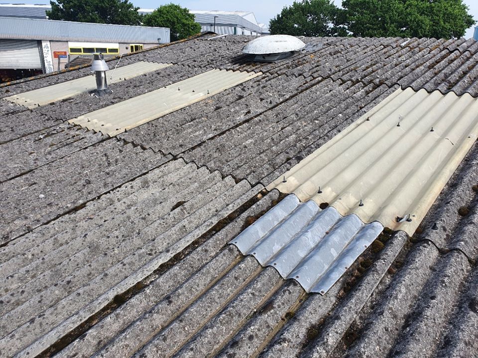 Rooflights repair work to a Workshop roof in Crawley West Sussex