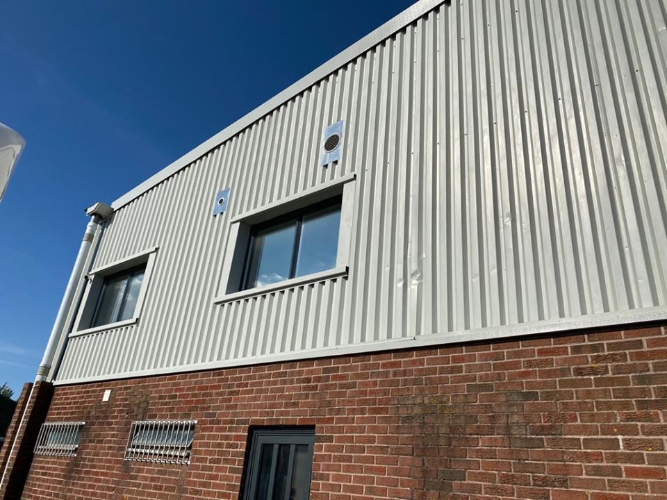 refurbishment work to the cladding of a warehouse Unit in Littlehampton, West Sussex