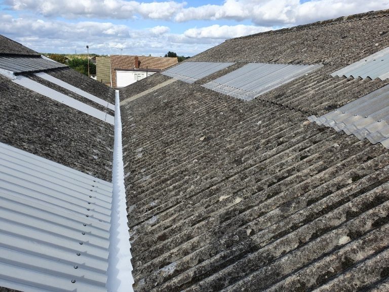 Gutter replacement to a warehouse roof in Benfleet Essex