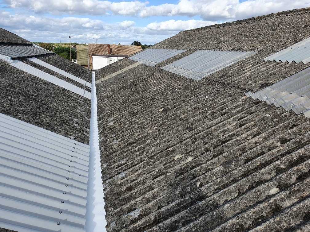 Gutter replacement to a warehouse roof in Benfleet Essex