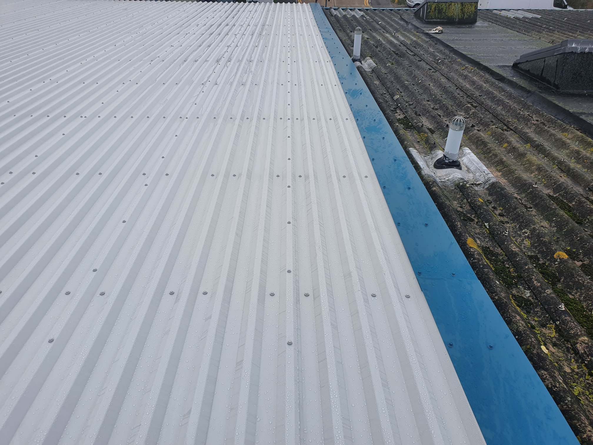Warehouse over roofing in Worthing West Sussex