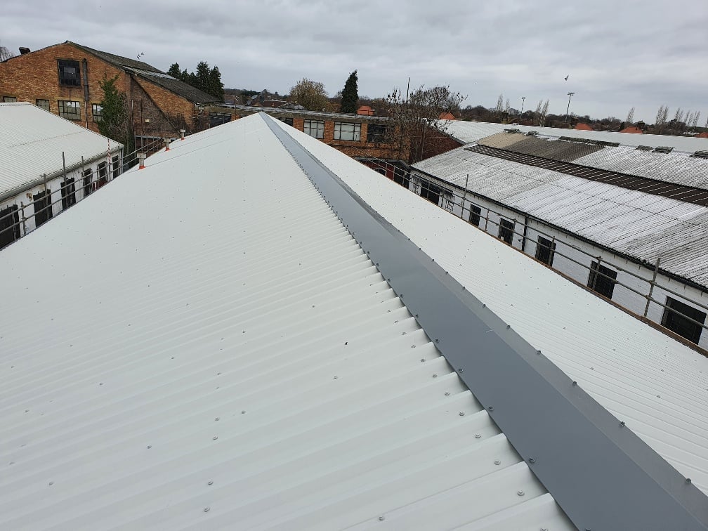 Factory over-roofing to an old roof in Hersham Surrey