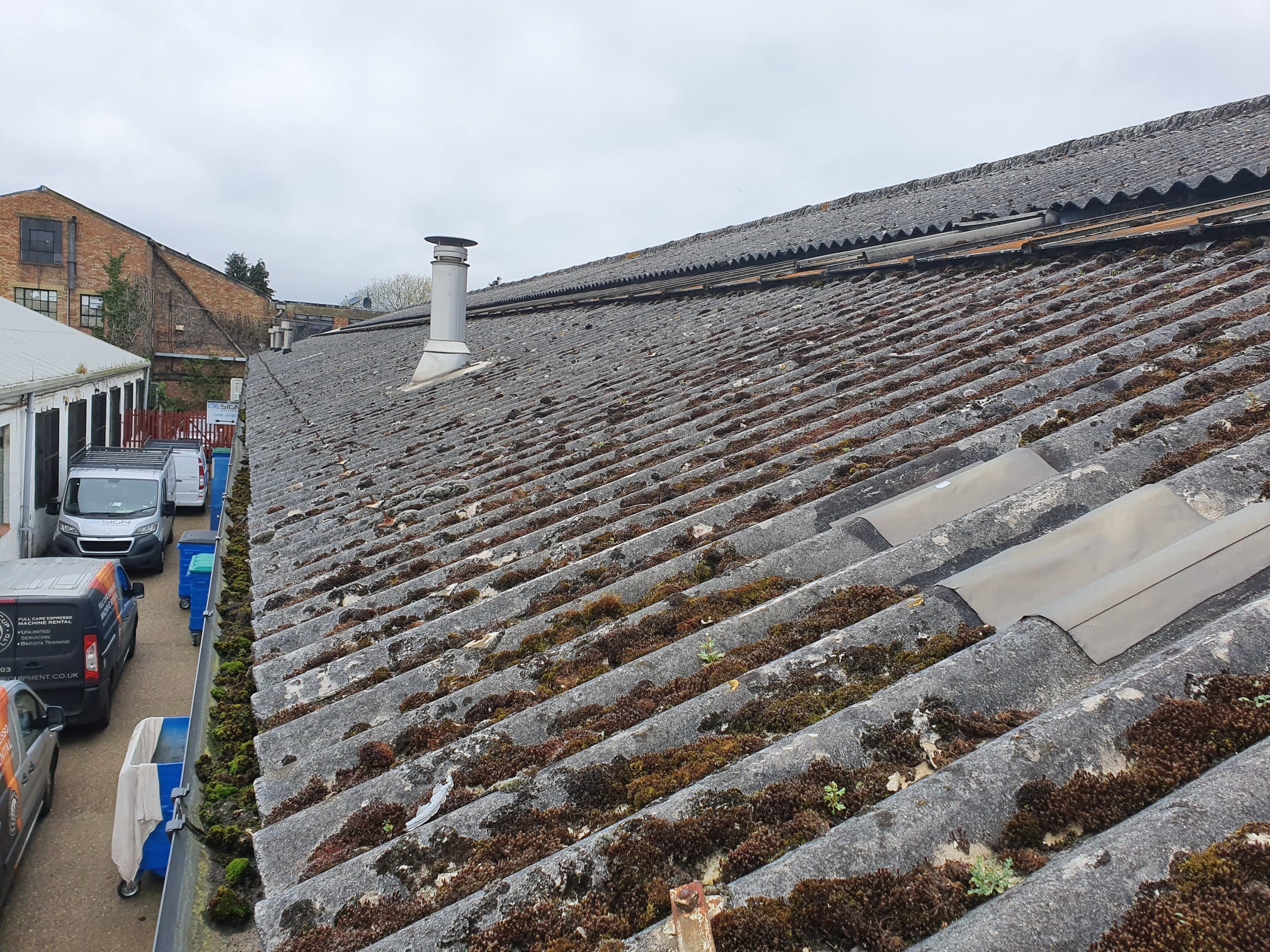 Over roofing to a warehouse roof in Hersham Surrey