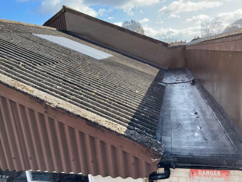 Gutter repair to a Warehouse roof in Benfleet Essex