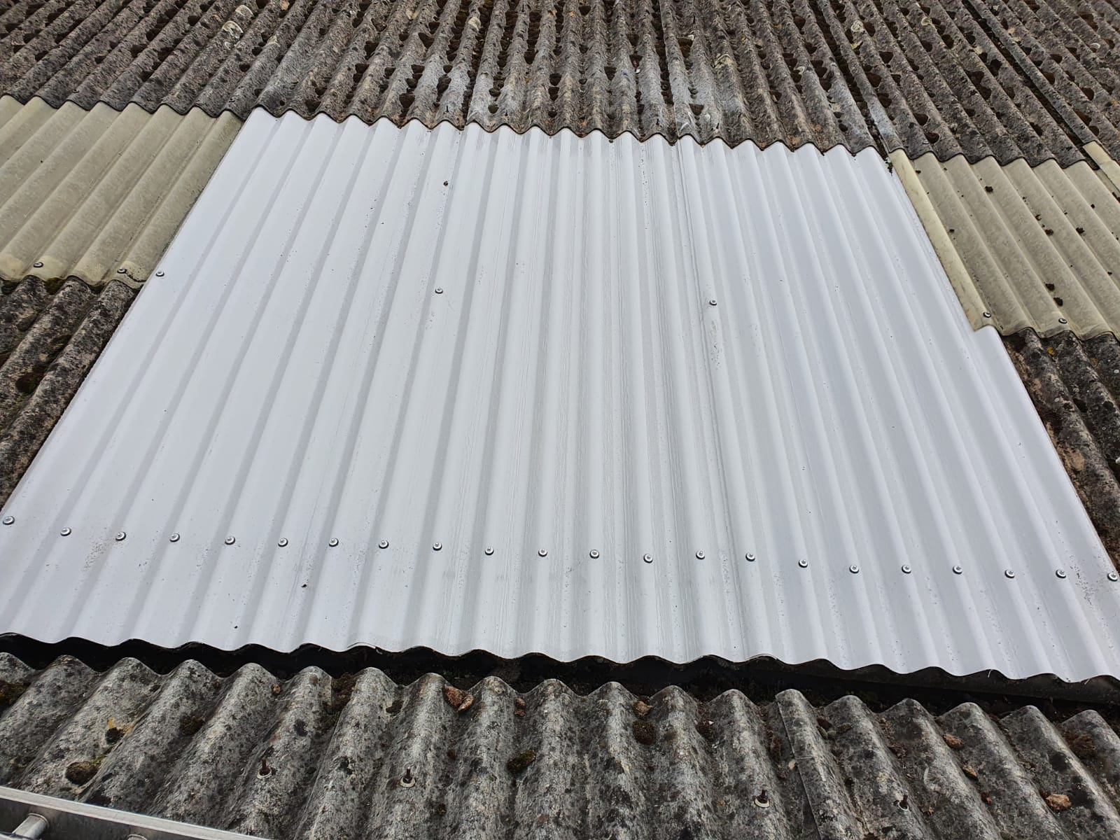 Roof repairs to a Factory Warehouse roof in Ash Vale Aldershot Hampshire