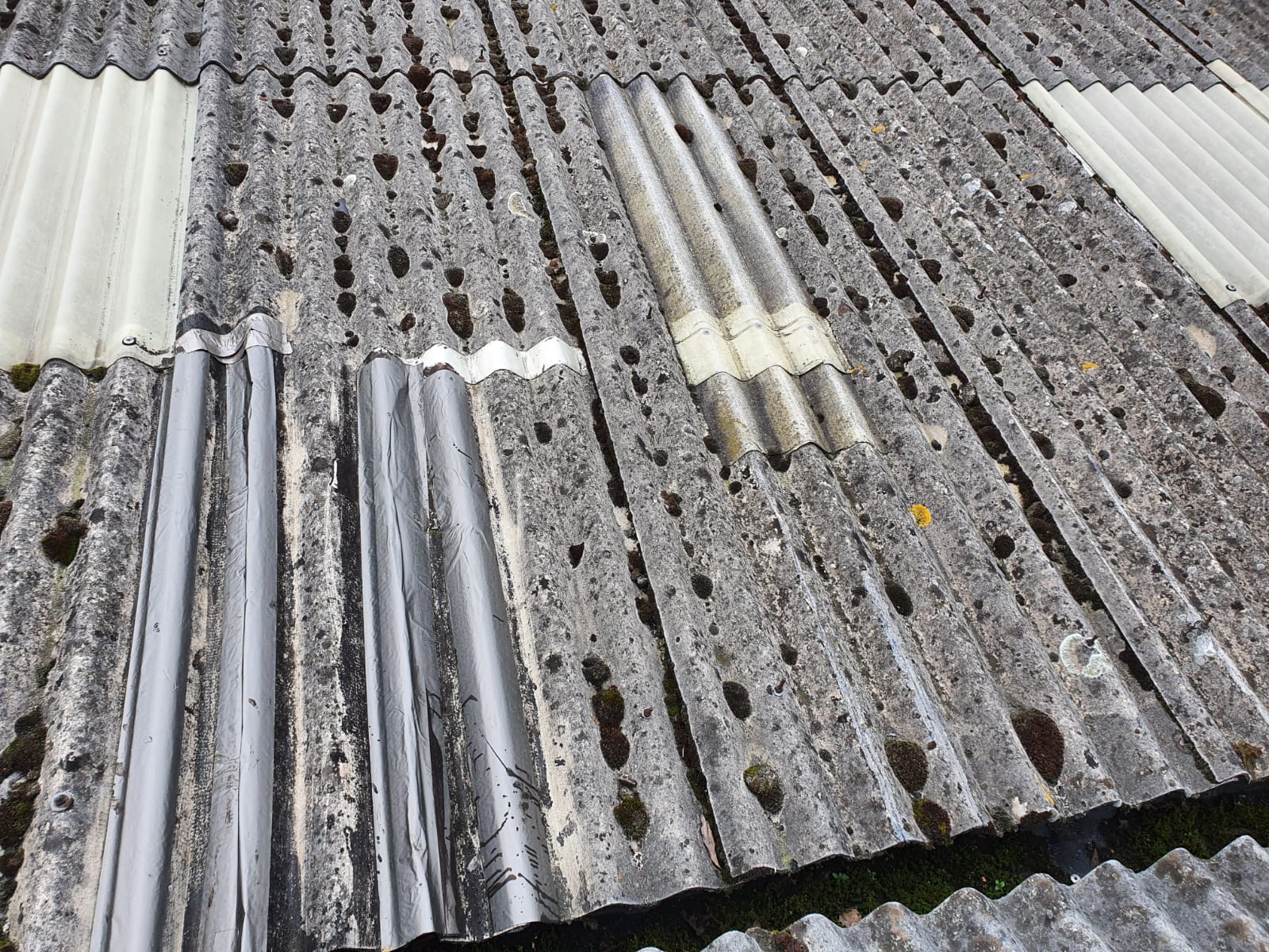 Roof repairs to a leaking Warehouse roof in Ash Vale Aldershot Hampshire