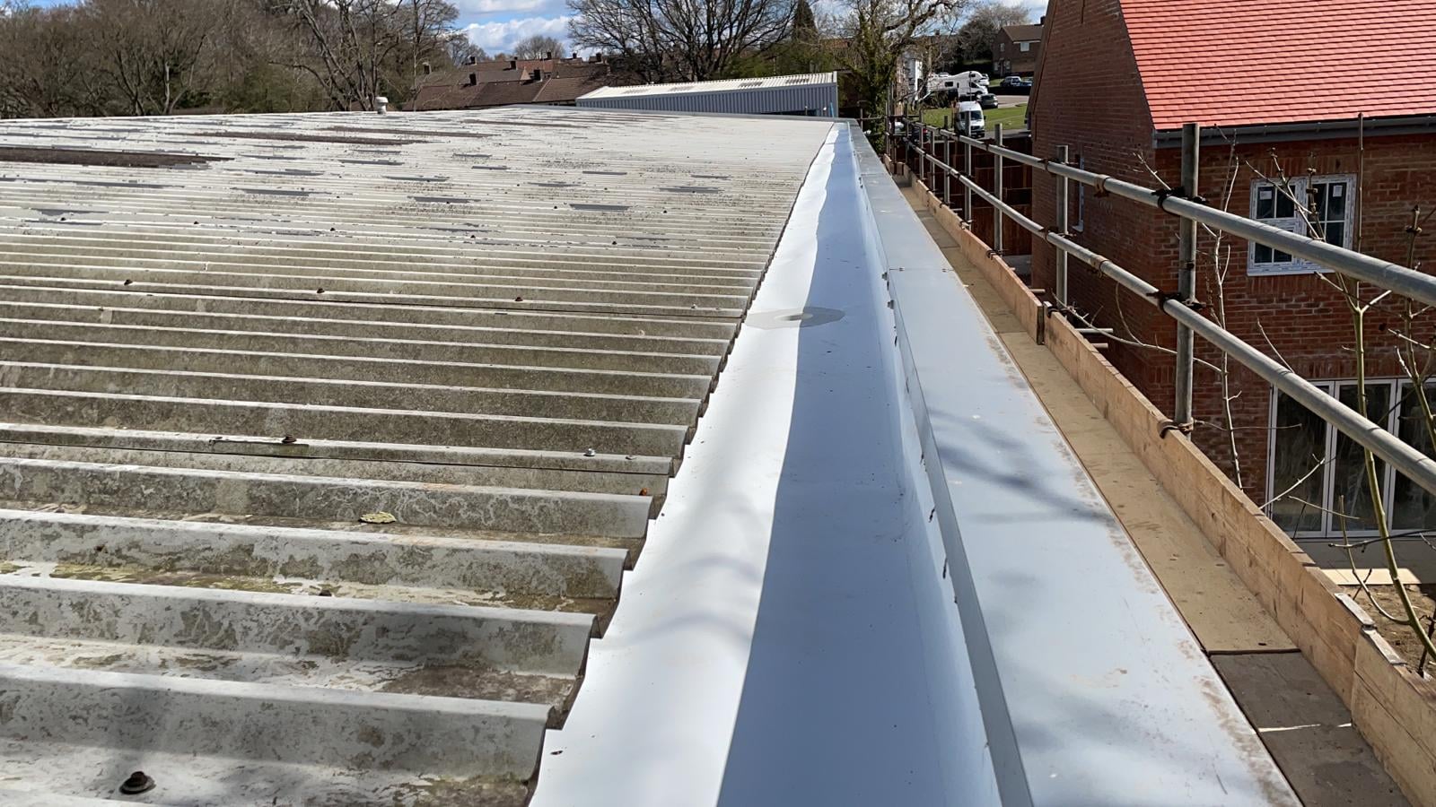 Repair work to a warehouse and office roof in Tadworth Surrey