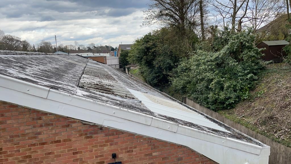 Roof repairs to a Warehouse roof in Reigate