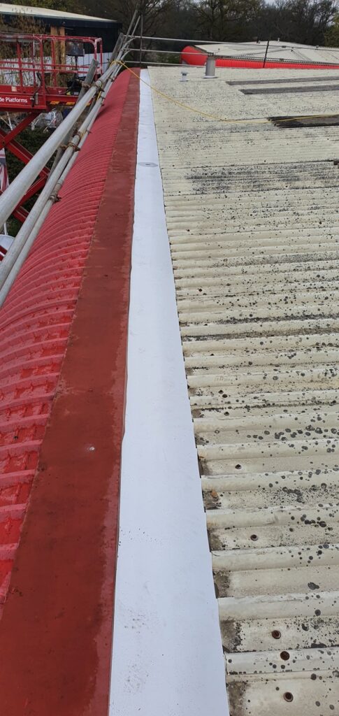 gutter lining work to a warehouse and office roof in Crawley