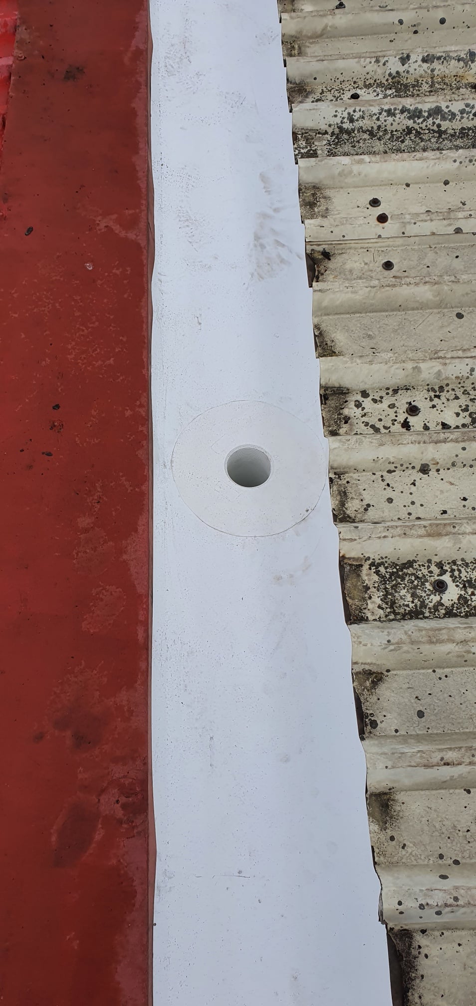 gutter work to a warehouse and office roof in Crawley