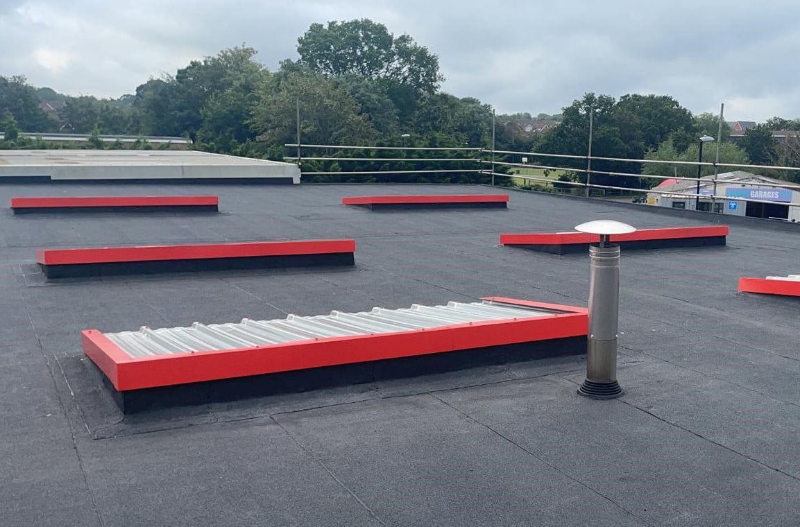 Felting and glazing project on a garage roof in Burgess Hill West Sussex
