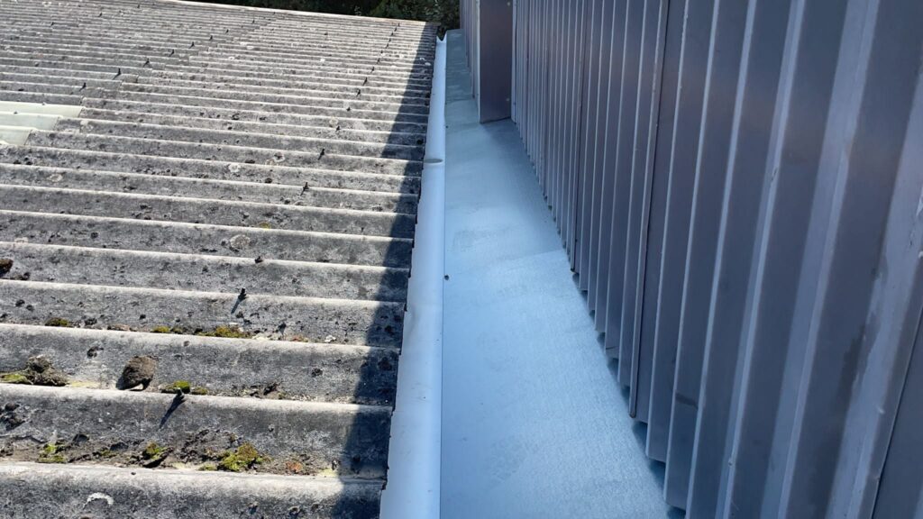 Gutter lining work to a warehouse and office roof in Crowborough East Sussex
