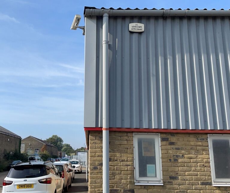 repairs to damaged cladding flashings on an industrial building in Faversham Kent