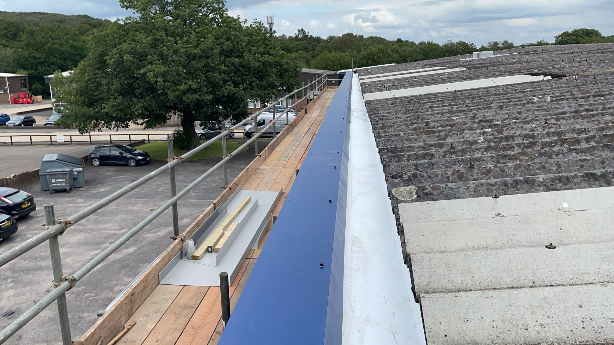 Guttering to a warehouse and office roof in Crowborough East Sussex