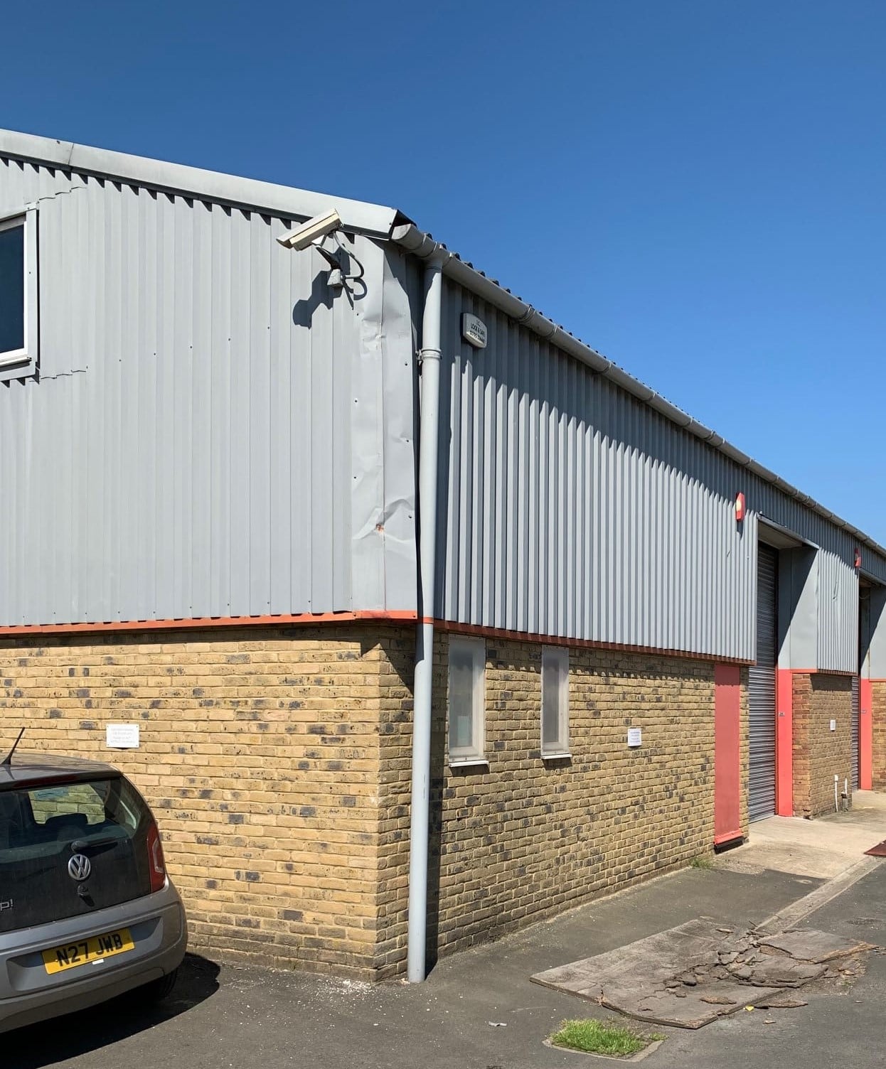Repairs to cladding on an industrial building in Faversham Kent