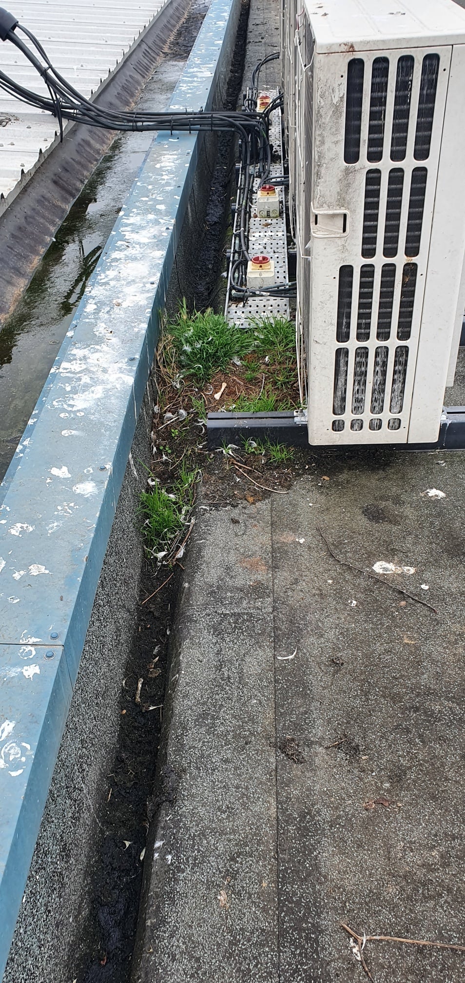 repair work to a warehouse and office roof in West Sussex
