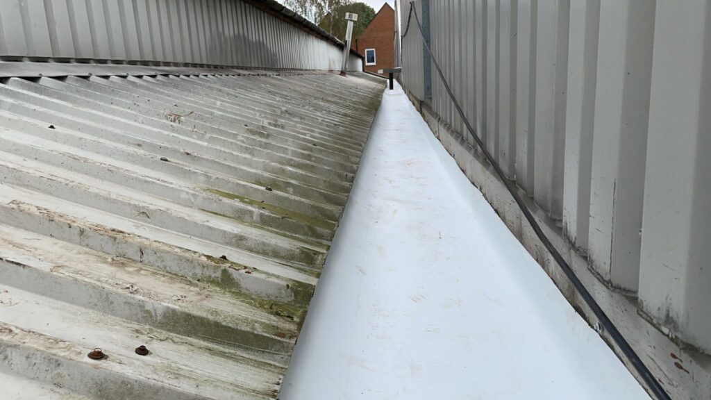 gutter lining work to a warehouse roof in Edenbridge Kent