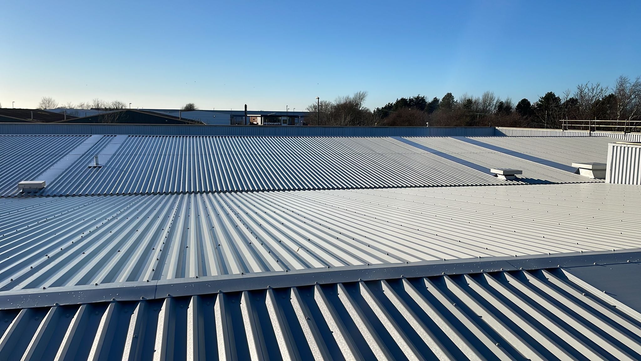Over-roofing and rooflights to a workshop roof in Bognor Regis, West Sussex