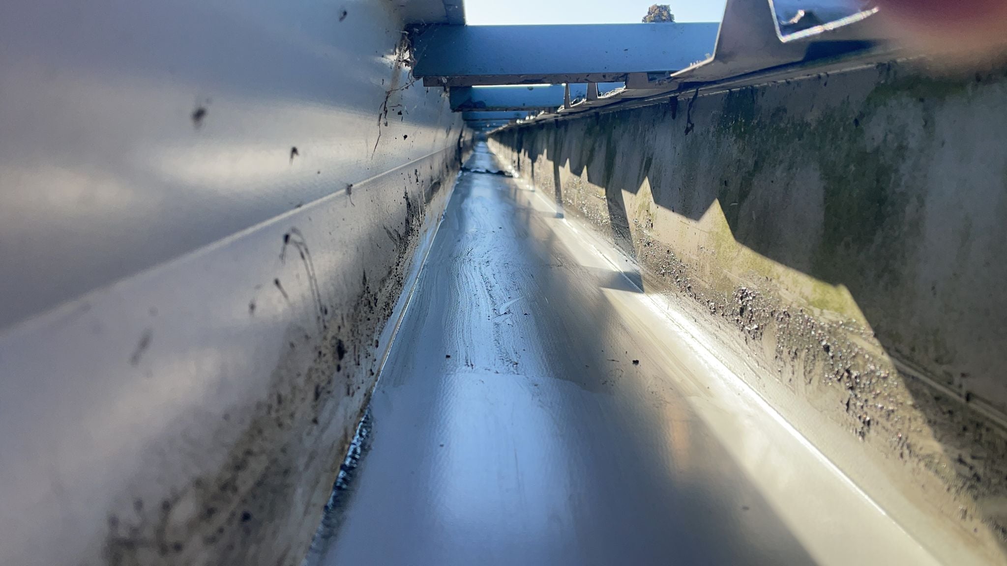 Gutter repairs to a warehouse roof in Basildon, Essex