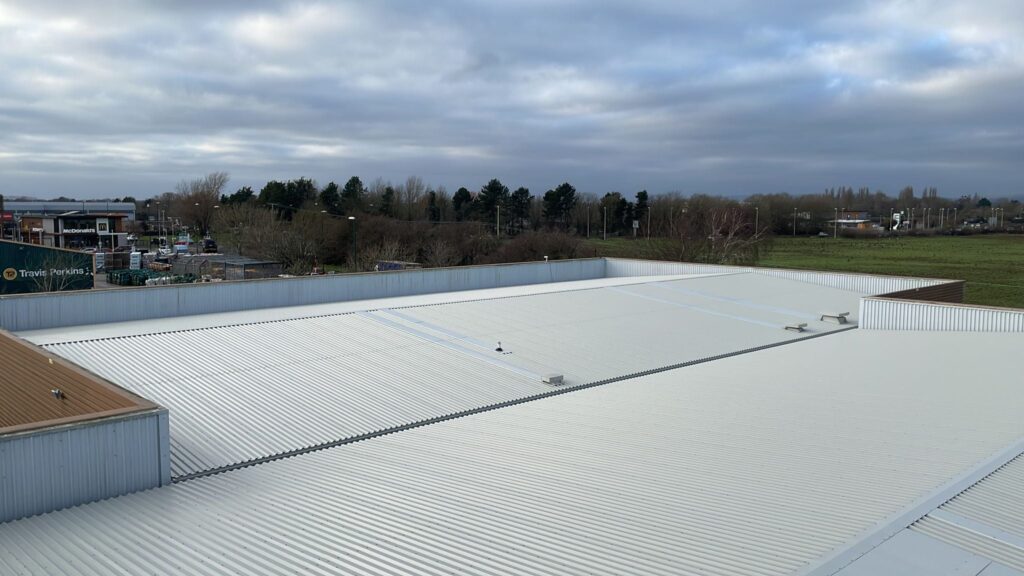 Over-roofing to an office and workshop roof in Bognor Regis, West Sussex