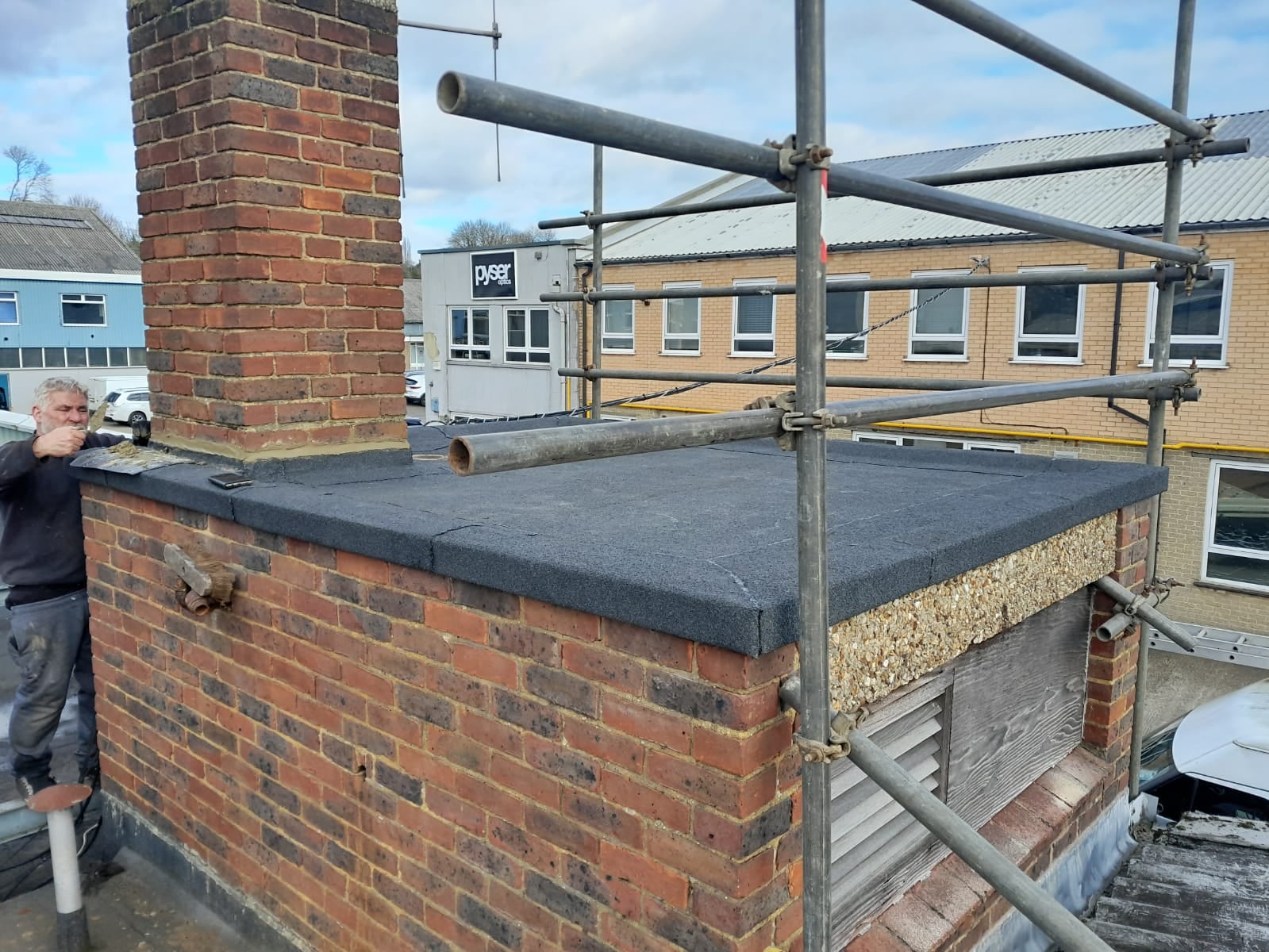 Felting contract on a tank housing roof at a factory in Edenbridge Kent