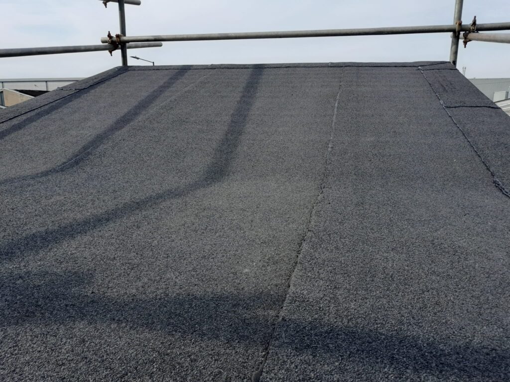Flat roof repairs to a warehouse shop in Crayford, Dartford, Kent