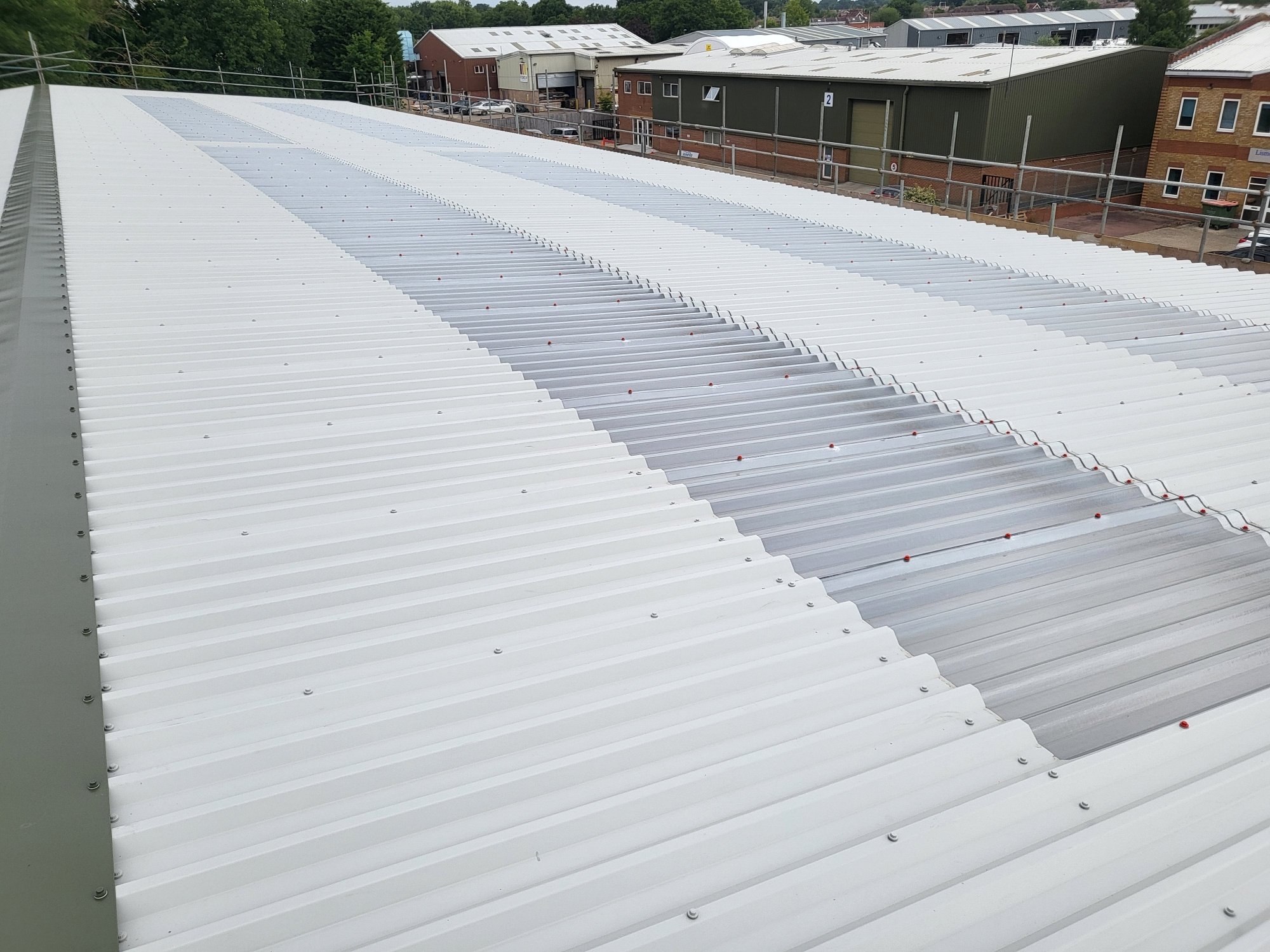 over-roofing to a warehouse roof in Partridge Green Horsham West Sussex