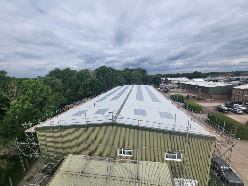 over-roofing to an office and warehouse roof in Partridge Green Horsham West Sussex