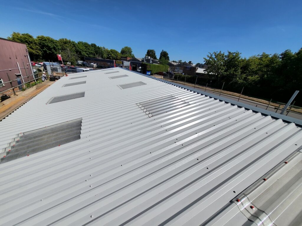 over-roofing to a workshop roof in, Burgess Hill West Sussex
