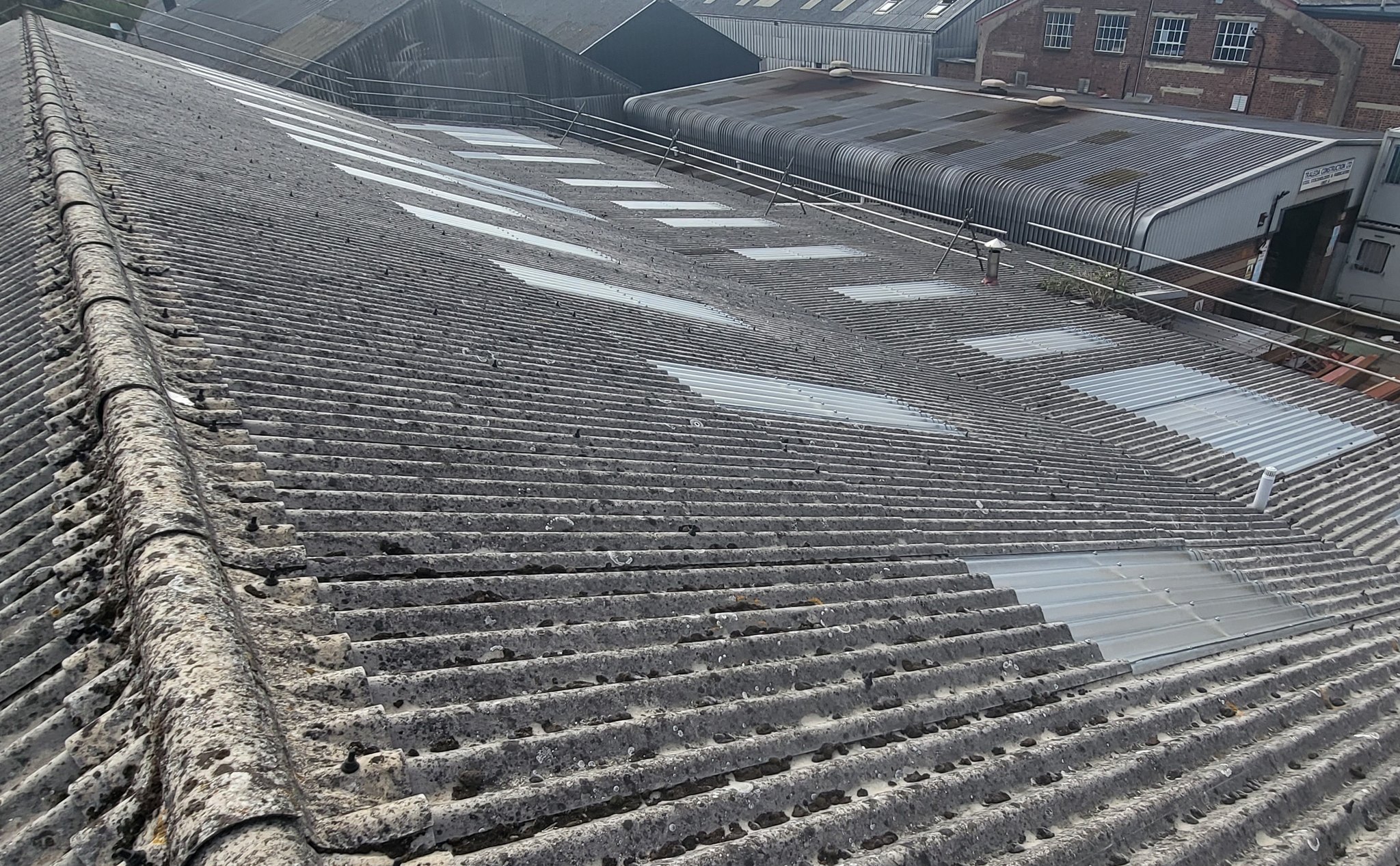 rooflight replacement and repair work to a warehouse and office roof in Surrey