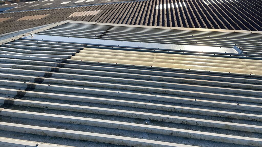 Leak repair work to a warehouse roof in Croydon, Surrey
