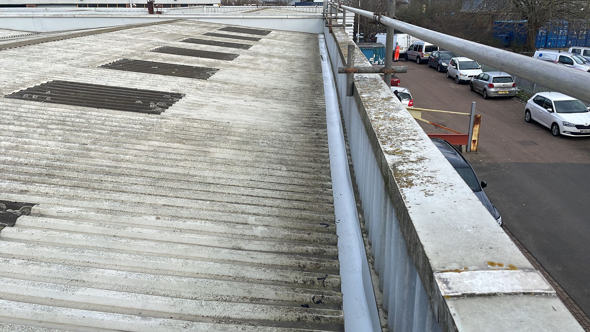 Gutter lining to a warehouse and office roof in Rochester, Kent