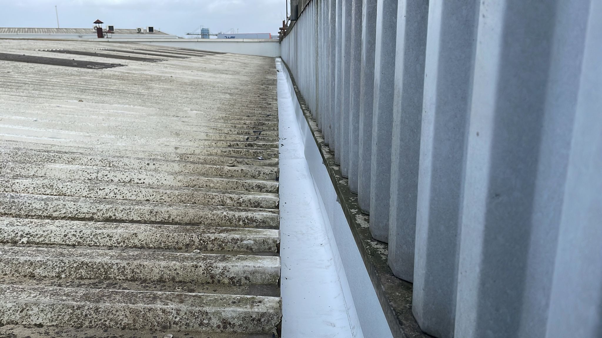 Gutter lining work to a warehouse roof in Rochester, Kent
