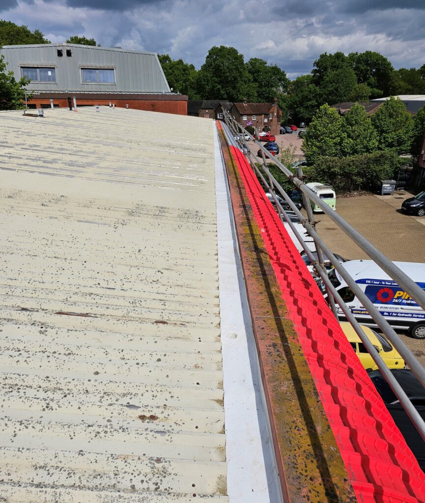 Gutter lining work to warehouse and office roofs in Crawley, West Sussex