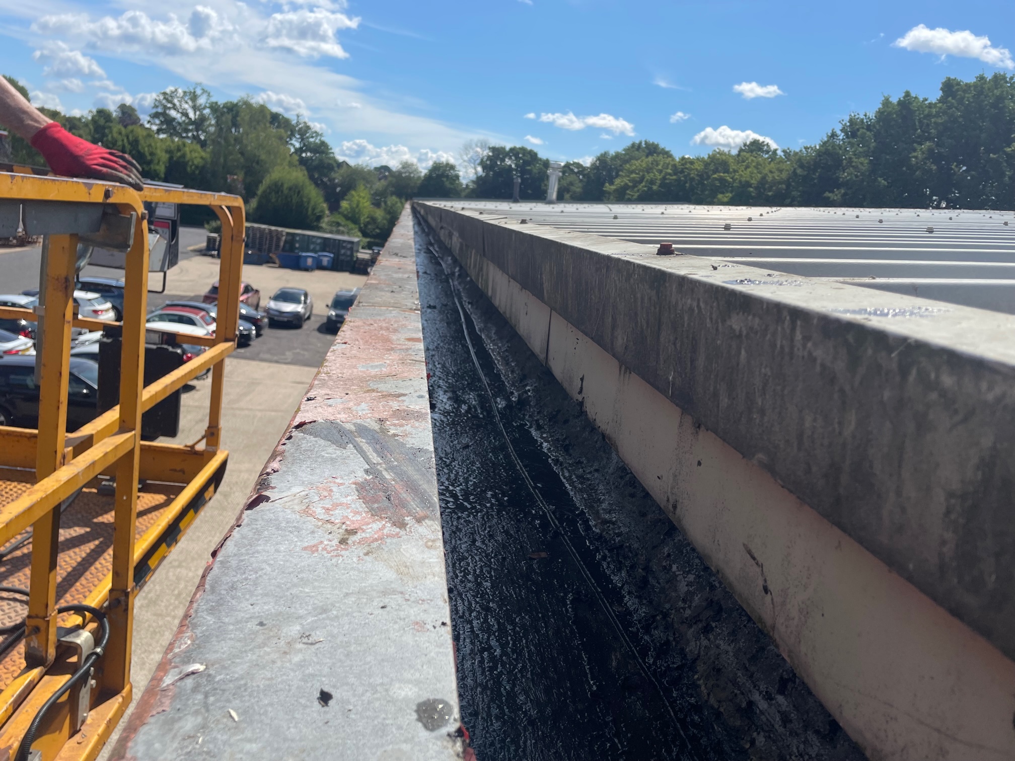 Gutter cleaning works over offices in Broadbridge Heath, Horsham, West Sussex