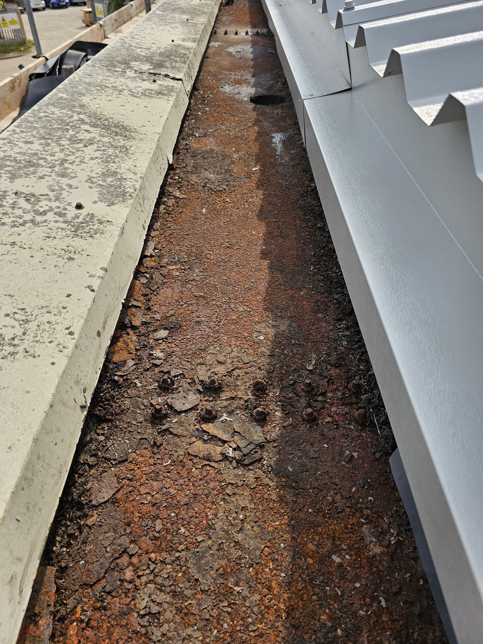 over-roofing to a warehouse roof in Partridge Green, Horsham