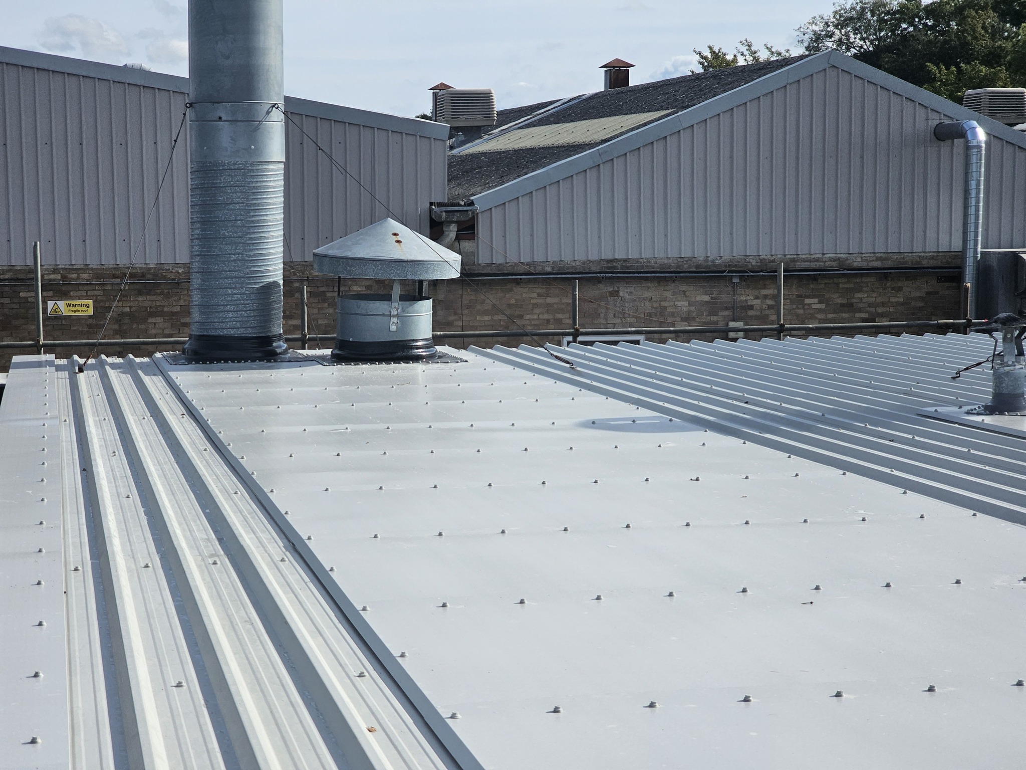 Over-roofing to a Workshop roof in Burgess Hill