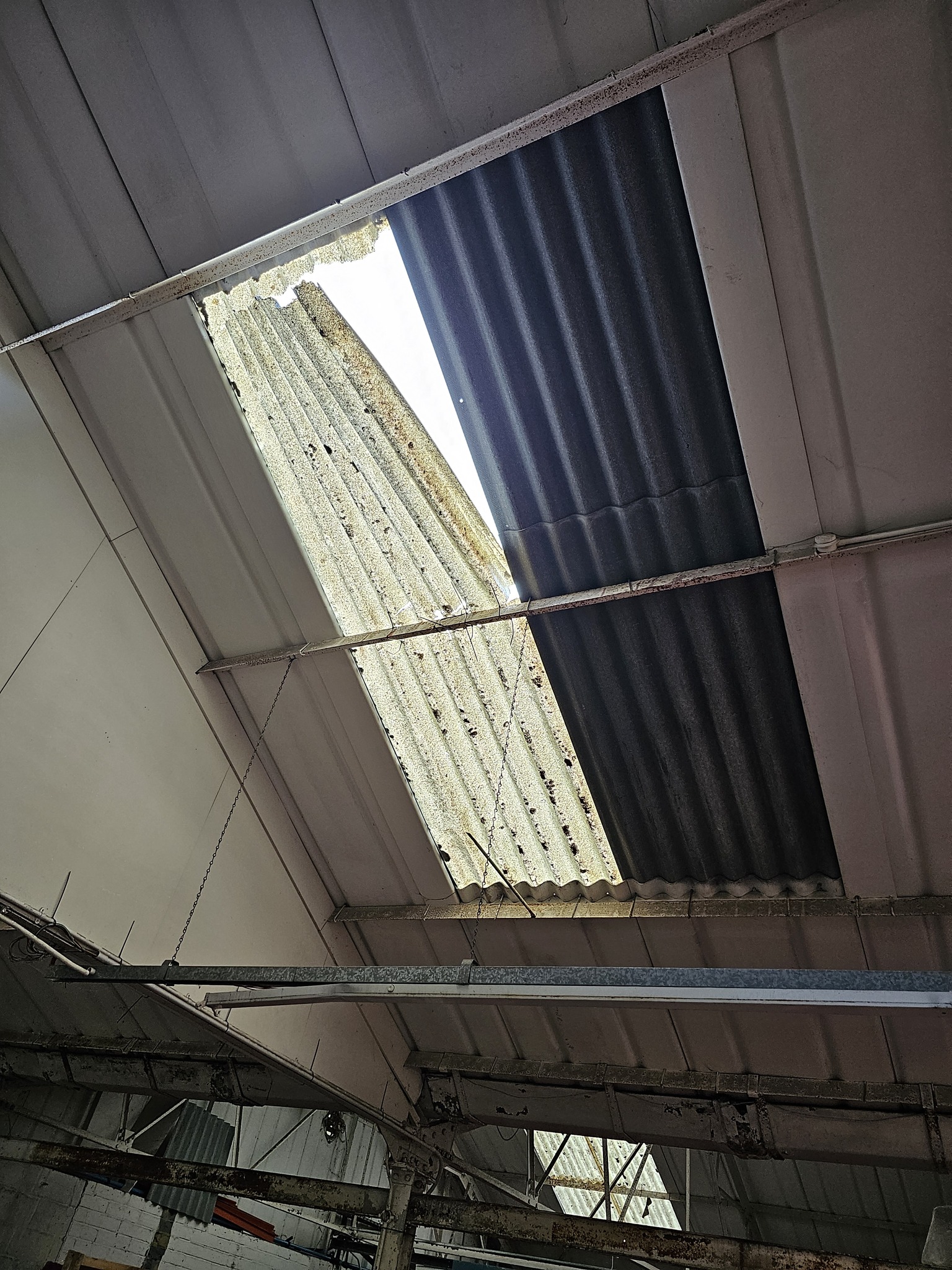 Pitched roof repairs to a Warehouse roof in Brighton