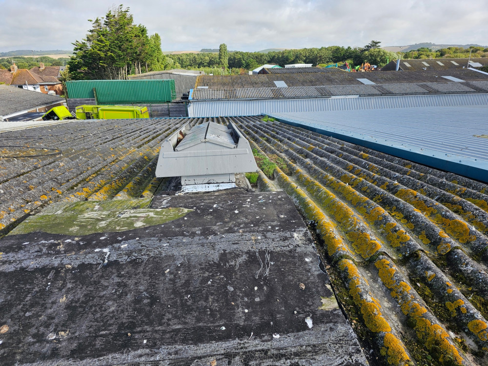 Over-roofing to a warehouse office roof in Worthing, Sussex