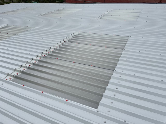 Over-roofing to a Warehouse and office roof in Hailsham, East Sussex