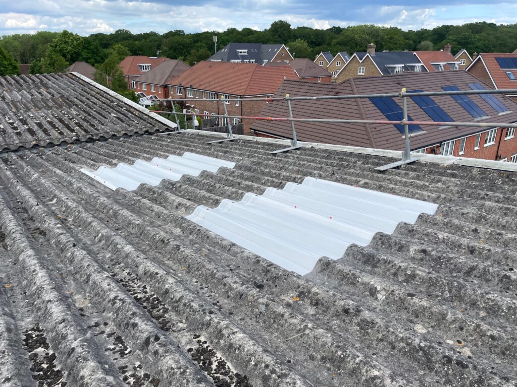 New translucent roof sheets for a Warehouse roof in Bookham, Leatherhead, Surrey