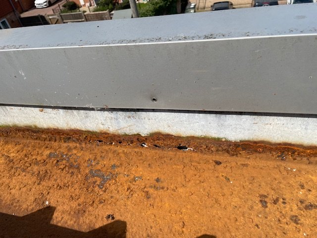 Gutter work serving an industrial Unit in Tadworth, Surrey.