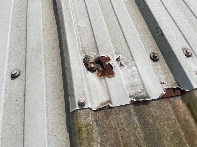 Roofing repairs to a warehouse roofs in Redhill, Surrey