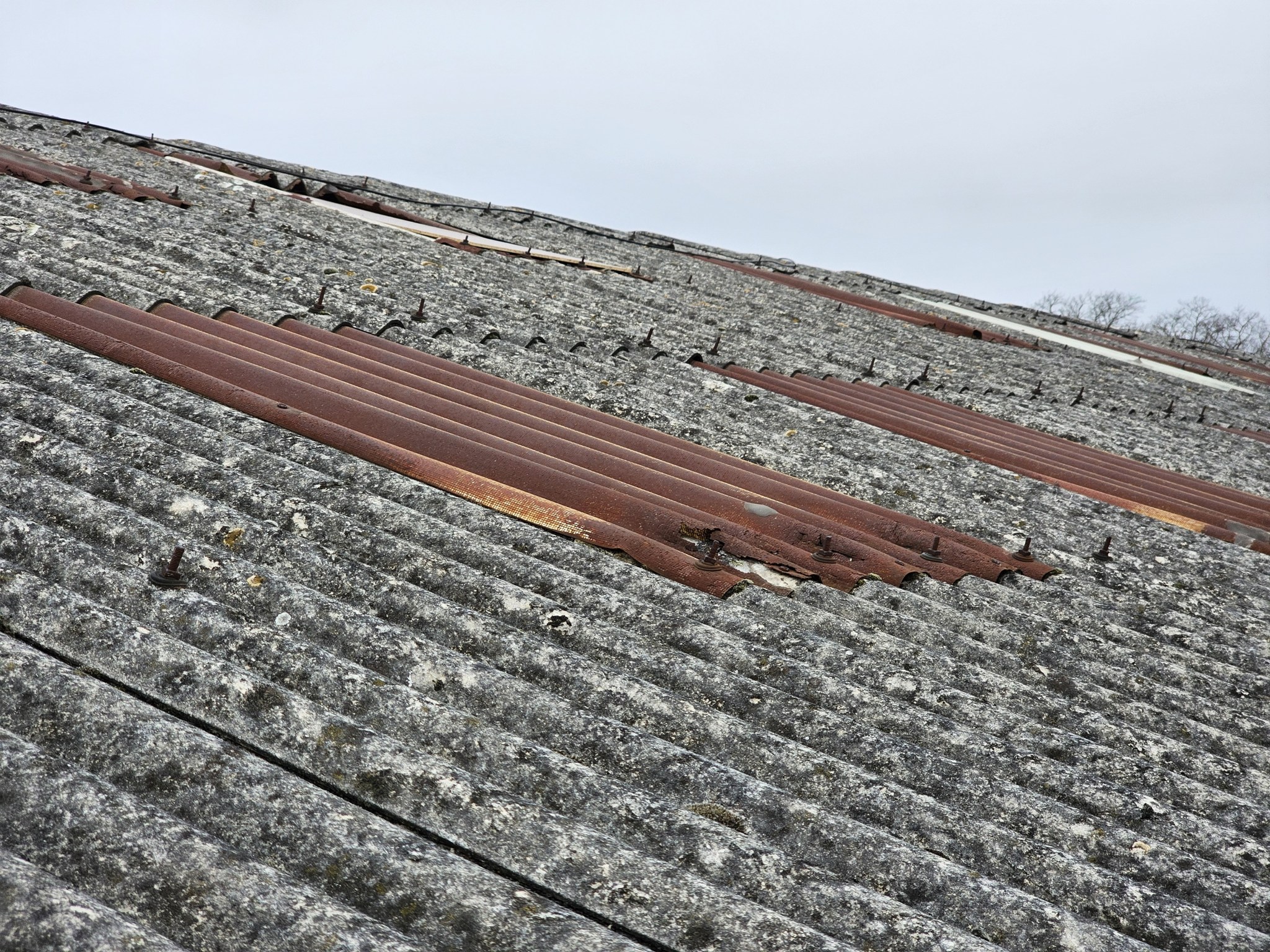 Gutter repair o a Warehouse roof in Grays, Essex
