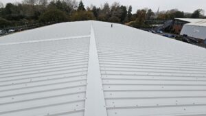 Over-roofing to an office and workshop roof in Chichester, West Sussex