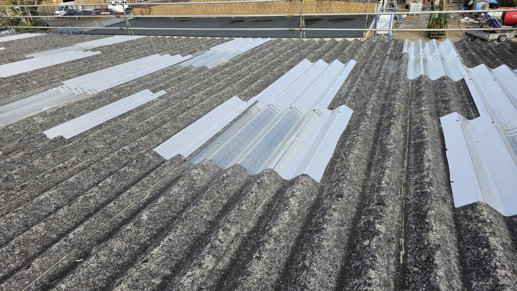 Replaced translucent roof sheets on a workshop roof in East Grinstead, West Sussex